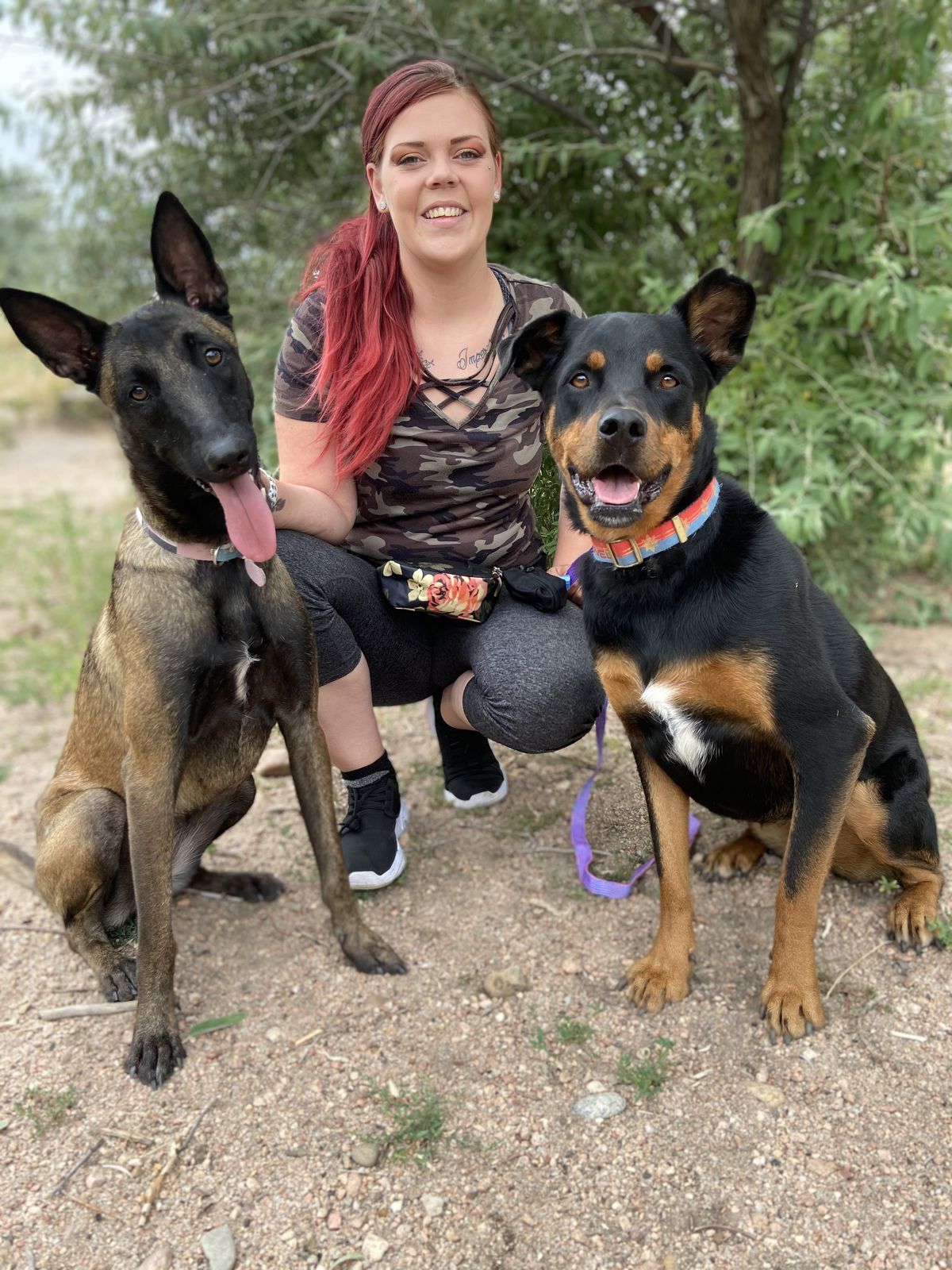 Savannah James of Paws & Praise with her two Belgian Malinois